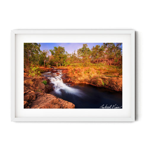 Fine art landscape photograph of Buley Rockhole waterfall at Litchfield National Park — golden afternoon light over cascading water and tropical forest, Australian landscape art print by Robert Vine.