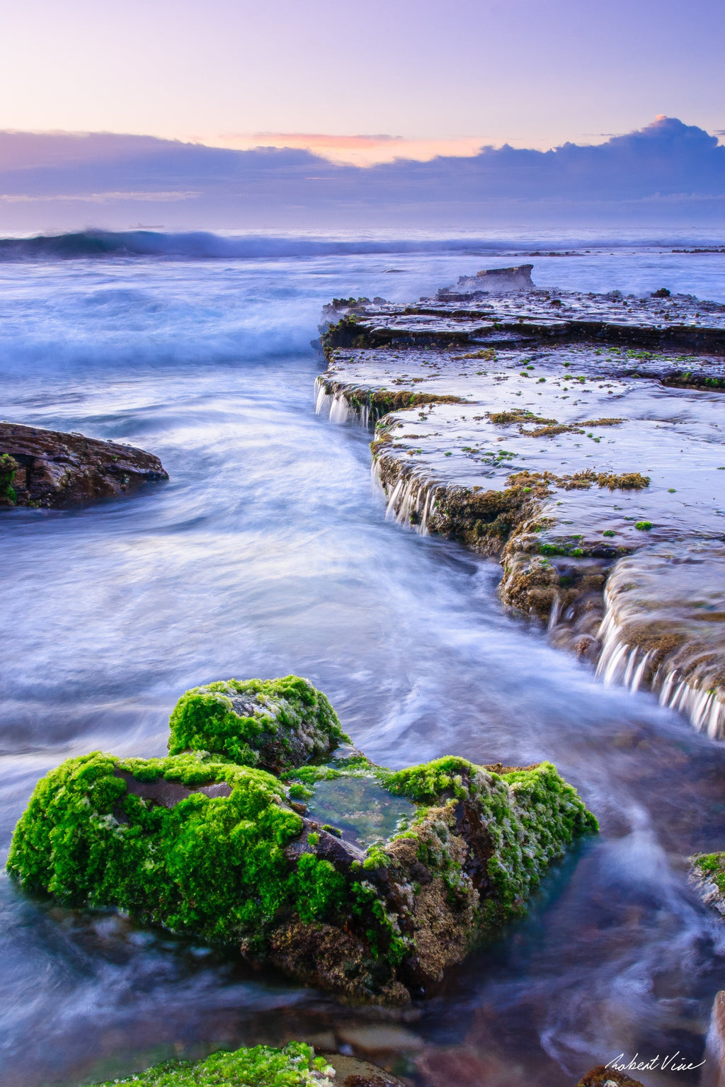 Fine art landscape photograph of Merewether Beach, Newcastle — sunrise over tidal rocks with green moss and cascading seawater, Australian coastal landscape art print by Robert Vine.