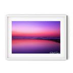 Fine art landscape photograph of Newcastle Canoe Pool at dawn — pink and violet sunrise reflecting over still water with anchored ships on the horizon, Australian coastal landscape art print by Robert Vine.