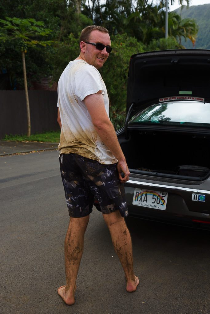 Robert Vine, landscape photography artist, getting muddy in Hawaii