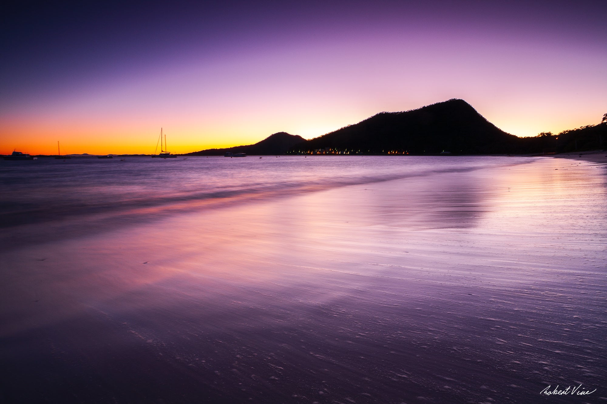 Limited edition framed print of Shoal Bay at dusk, Port Stephens by Robert Vine, with soft waves, glowing sky and silhouetted headlands