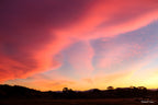 Limited edition framed art print of a dramatic pink and orange sunset sky over Royalla near Canberra, photographed by Robert Vine.