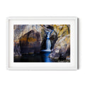Long exposure photograph of a small waterfall flowing through sculpted granite rock formations at Googong Cascades, captured by Robert Vine.